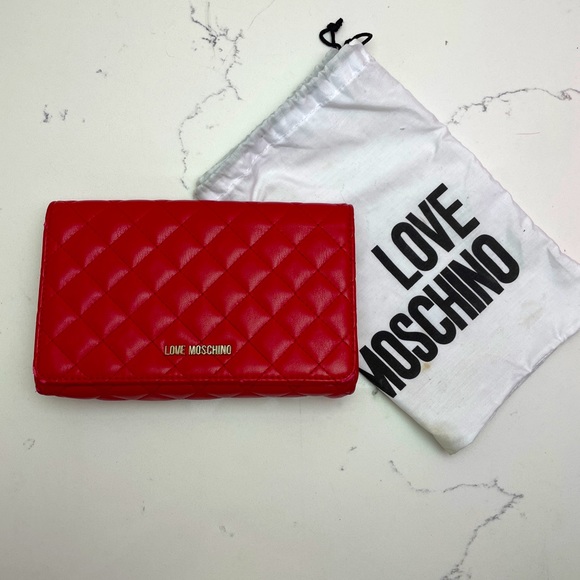 Moschino Handbags - Quilted Moschino leather purse in sexy red 🔥
